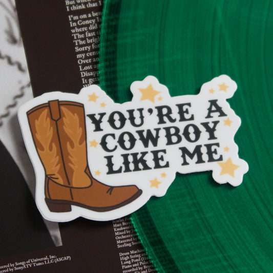 The “Cowboy Like Me” Sticker