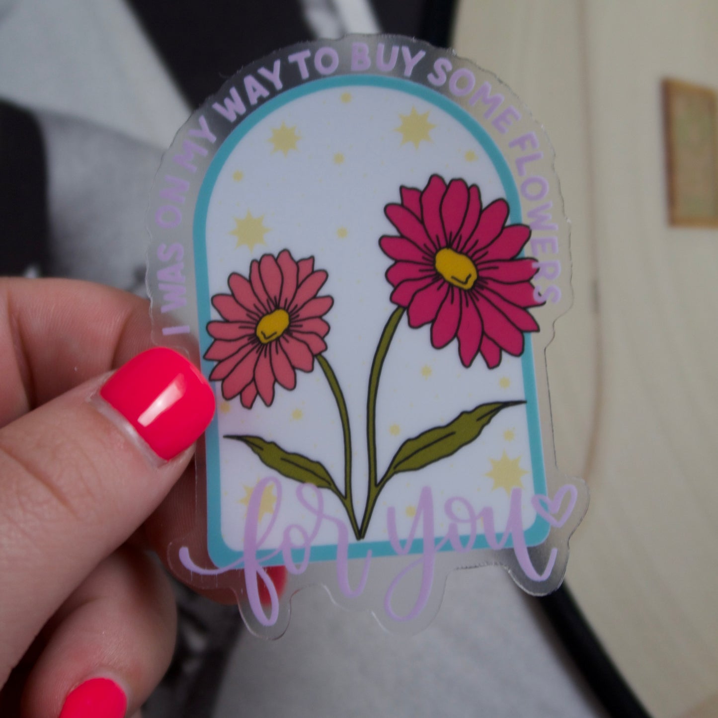 The “omw to buy some flowers” Sticker (Clear)